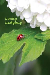 Lucky Ladybug: Wide ruled journal notebook with a happy ladybug just hanging out on the cover....