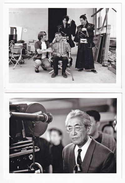 N.p.: Oshima Productions, 1999. Two vintage reference photographs taken on the set of the 1999 film,...