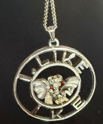 I Like Ike [pendant with rhinestone elephant]