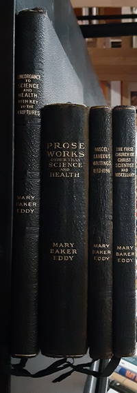 A lot of four Mary Baker Eddy titles: A Complete Concordance to Science and Health, With Key to...