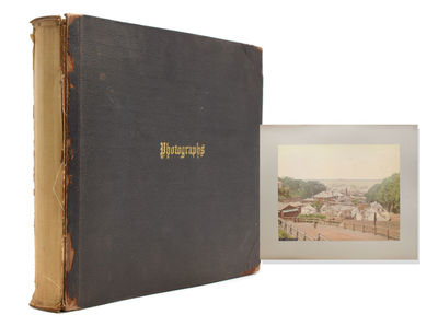 Album of Japanese 8 hand-coloured photographs and 14 others mostly Mexican including birds eye view of the city of Zacatecas, Statues of Guitlahuac, Hotel del Jardin, water carere, La Viga tipped into an album