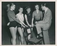 Original photograph of producer Michael Todd with several stage actresses, circa 1940s
