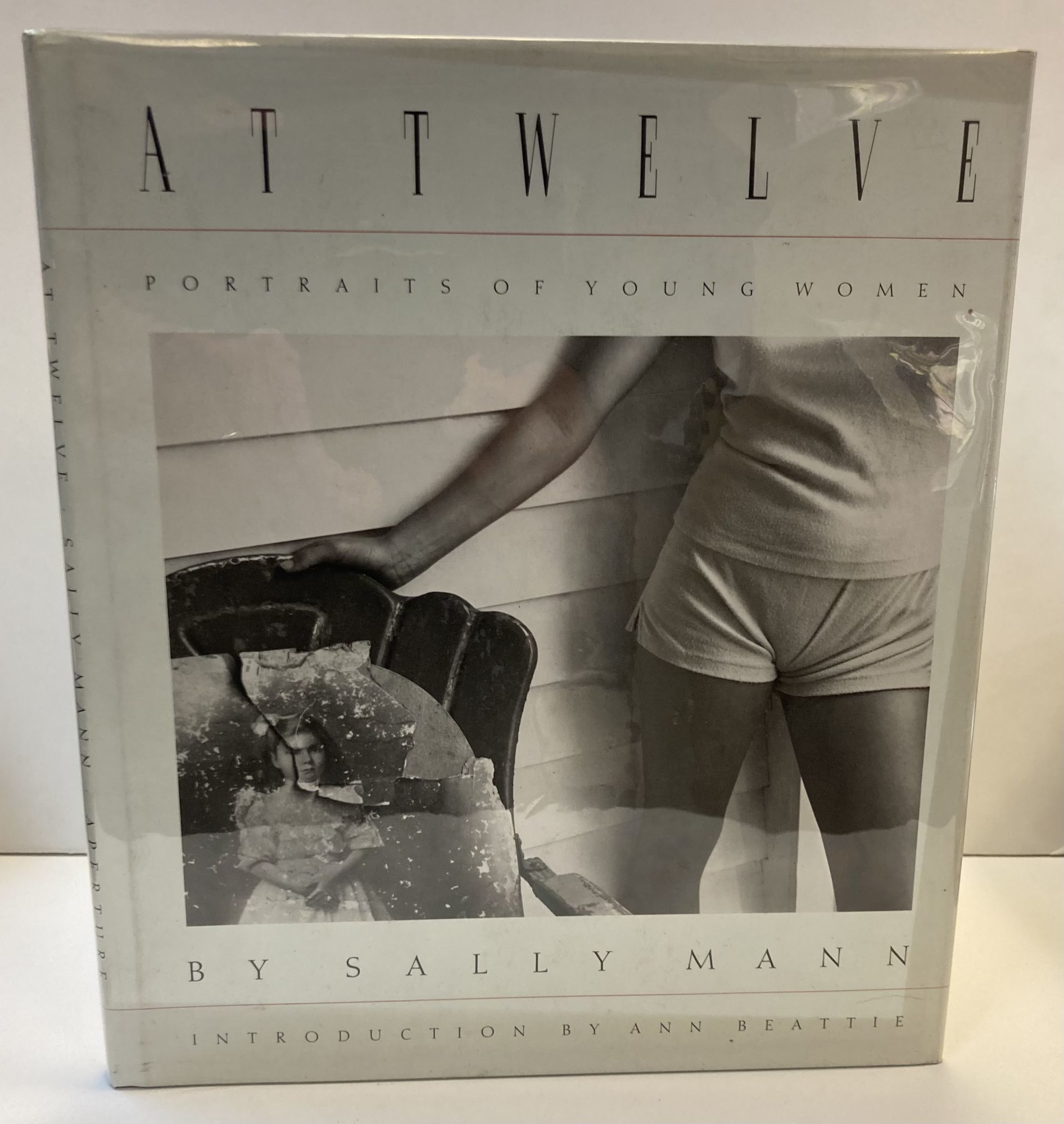 AT TWELVE: PORTRAITS OF YOUNG WOMEN [SIGNED] by Mann, Sally