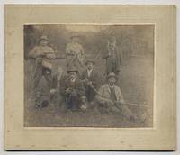 Photograph of six men with shotguns and a boy, apparently unarmed, but I don't like the look of him either