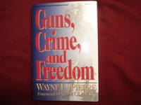 Guns, Crime, and Freedom. Signed by the author.