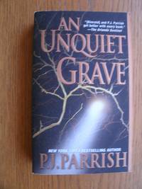 An Unquiet Grave by P.J Parrish - Paperback - Signed First Edition - 2006 - from Scene of the Crime Books, IOBA (SKU: biblio10081)