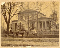 Photo of Greek Revival House with carraige in front