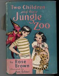 TWO CHILDREN AND THEIR JUNGLE ZOO