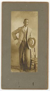 [Cabinet card photograph]: Impressively Mustached Young African-American Man. Circa 1885