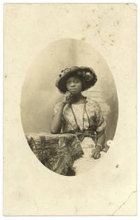[Real Photo Post Card]: Very well-dressed Young African-American Woman. Circa 1910