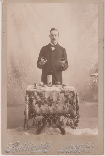 Cabinet card photograph of salesman