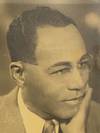 View Image 5 of 5 for . . Untitled (portrait of a well-dressed African-American man wearing glasses, dated 1937) Inventory #4302