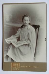 Cabinet Photograph: Portrait of a Young Woman with a Magazine.