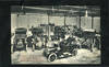 Real Photo Postcard of Lovett's Motor Garage in Ealing, London