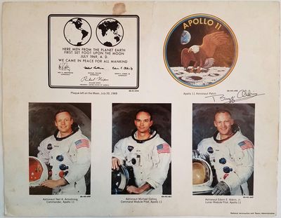 Buzz Aldrin Signs An Apollo 11 Poster