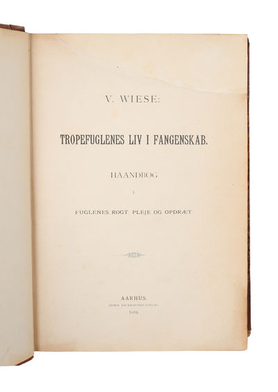 Tropefuglenes Liv i Fangenskab. Haandbog i…