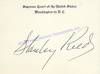 Justice Reed Signs A Supreme Court Card