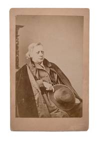 [Cabinet card studio portrait of Henry Ward Beecher, seated holding his hat]