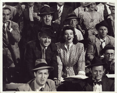 WOMAN OF THE YEAR | SPENCER TRACY, KATHARINE HEPBURN AT BALL GAME (1942) Photo