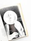 THE REAL TIN FLOWER: Poems About the Real World at Nine