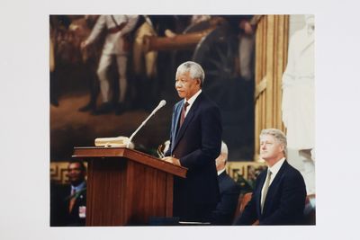 NELSON MANDELA AND BILL CLINTON PHOTOGRAPH [Signed by Mandela]