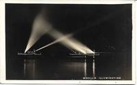 image of U.S. Warships Illuminated at Night on 1920s-30s Real Photo Postcard (RPPC)