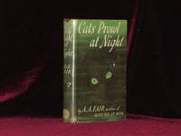 CATS PROWL AT NIGHT