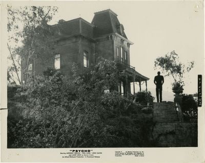 Psycho (Original photograph of Anthony Perkins in front of the Bates Motel, from the 1960 film)