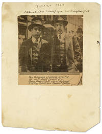 Newspaper clipping mounted to onionskin sheet