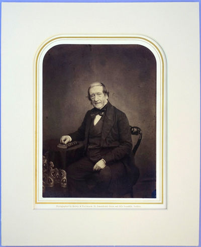 Portrait photo by Maull and Polyblank. Matted