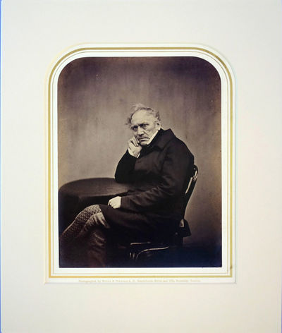 Portrait photo by Maull and Polyblank. Matted