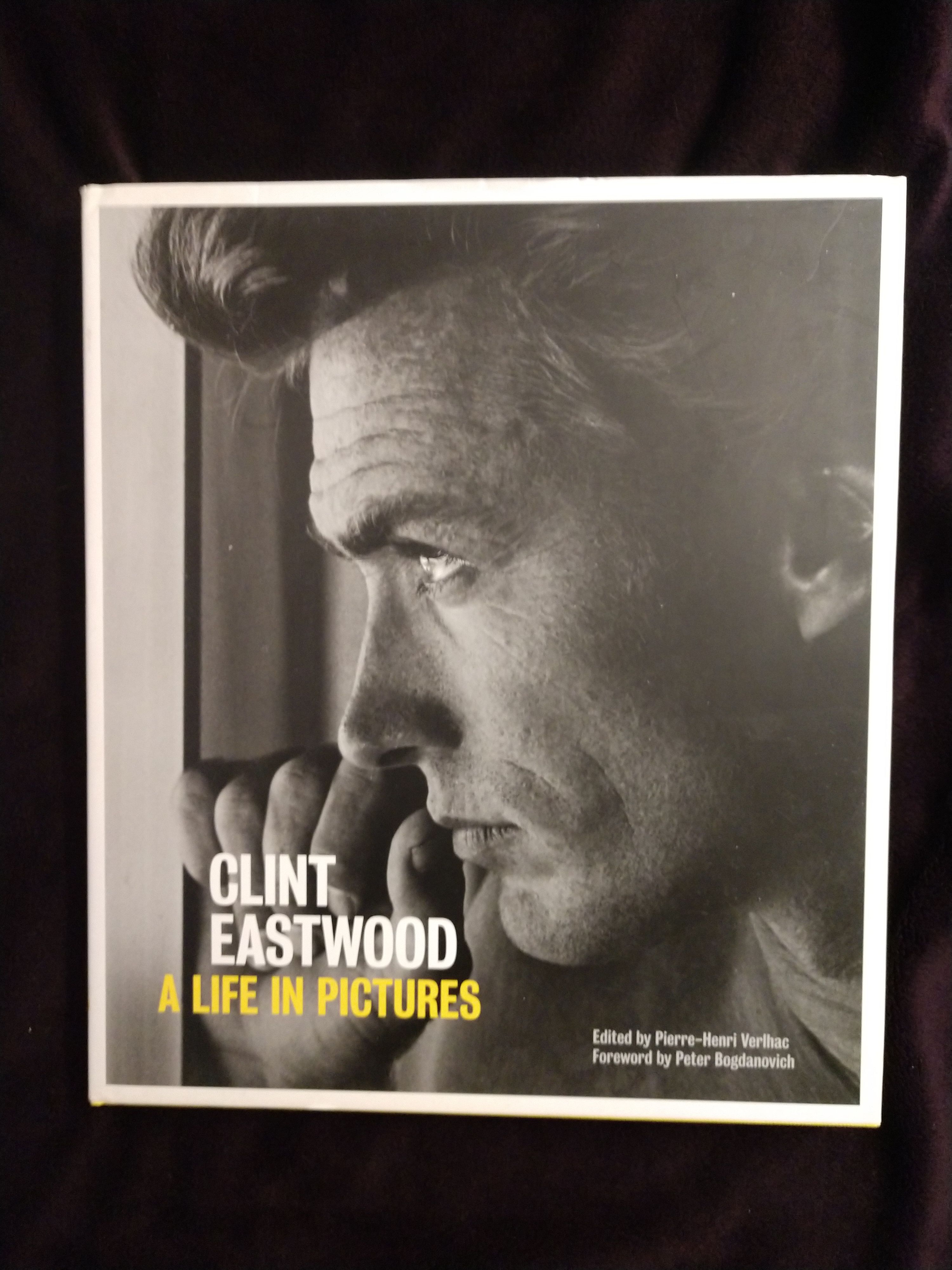 洋書 Clint Eastwood: A Life in Pictures Clint Eastwood - A Movie Legend's Life in Pictures 50 Years of