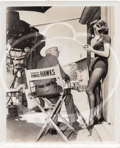 Burbank, CA: Warner Brothers, 1958. Three vintage reference photographs from the classic 1959 Wester...