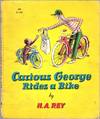 Curious George rides a bike