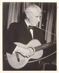 image of Original photograph of Carl Sandburg playing the guitar, circa 1955