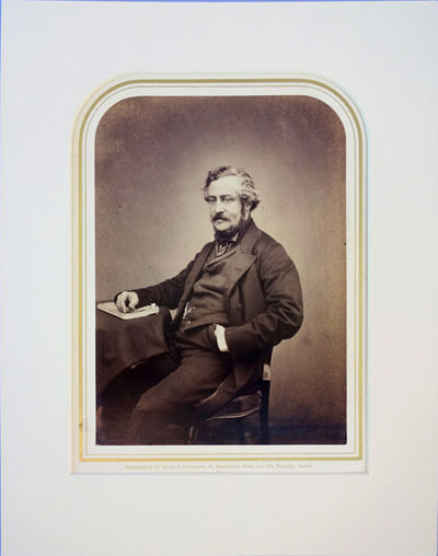 Portrait photo by Maull and Polyblank. Matted