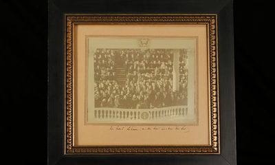 “Ask not what your country can do for you – ask what you can do for your country.”: A Signed Photograph of the Inauguration of John F. Kennedy, Showing Him Taking the Oath of Office