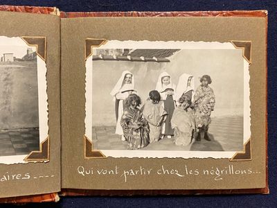 [AFRICAN COLONIALISM FOR CHILDREN]. Photo Album of Belgian Children (novitiates?) posed as missionary nuns, some of whom are in blackface