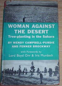 Woman Against The Desert. Tree-planting in the Sahara.