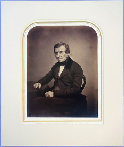 Portrait photo by Maull and Polyblank. Matted