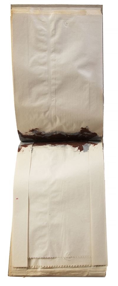 An untitled unique bookwork by the celebrated German book artist. [57] halves of bound-in paper bags