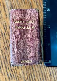 THE BOOK OF COMMON PRAYER. And administration of the Holy Communion. According to the use of The church of England.-----Bound with; Hymns Ancient and Modern. For use in the services of the Church. Complete Edition
