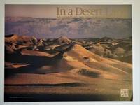 Promotional Poster for IN A DESERT LAND by Neil Folberg - First Printing - from Dale Steffey Books (SKU: 007212)