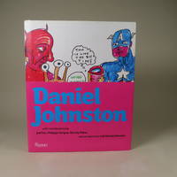 image of Daniel Johnston, with contributions by Jad Fair, Philippe Vergne, Harvey Pekar and an interview with Daniel Johnston