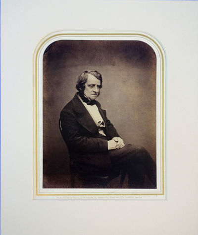 Portrait photo by Maull and Polyblank. Matted