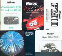 Nikon Camera manuals for the Nikon FM10, Nikkor 1-5mm f/2.5, and Nikon Zoom Touch 470 / 470QD + the Nikon N6006 Daring Photography System Information and Nikkormat Photography Guide booklets.