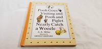Pooh Goes Visiting and Pooh and Piglet Nearly Catch a Woozle by A. A. Milne - Hardcover - 1990 - from Corliss Books (SKU: 014515)