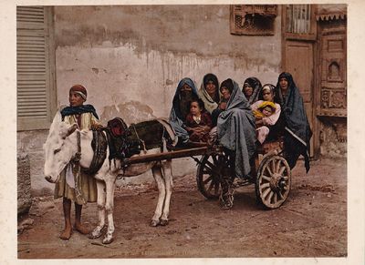 Early Photochrome photograph of Egyptian Women riding on cart, Circa 1890s