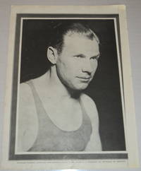 A vintage magazine photographic portrait of the AMERICAN OLYMPIC SPRINTER CHARLEY PADDOCK, who won several gold medals and set world records.