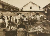 'A Javanese Market Place'. A vintage sepia-toned carbon print on the original flush-cut thick...